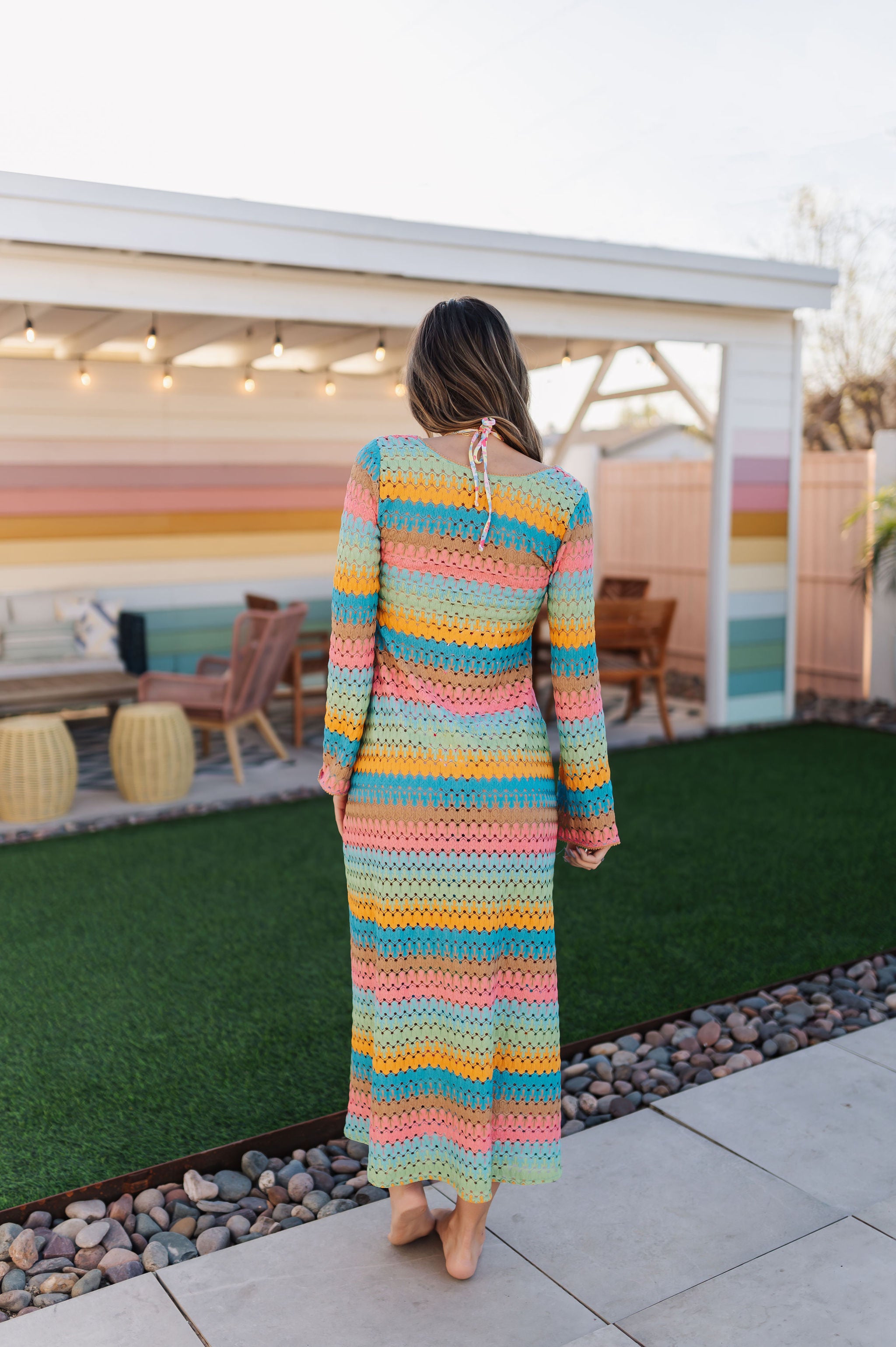 Back view of multi-striped crochet Vacay Coverup with long sleeves.